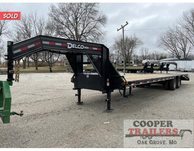 2022 Delco 24k Low-Pro Gooseneck 102x30 Flatbed GN at Cooper Trailers, Inc STOCK# GTC25319 Exterior Photo